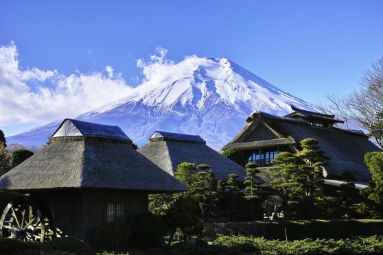 mount-fuji-rising-above-houses-in-japan